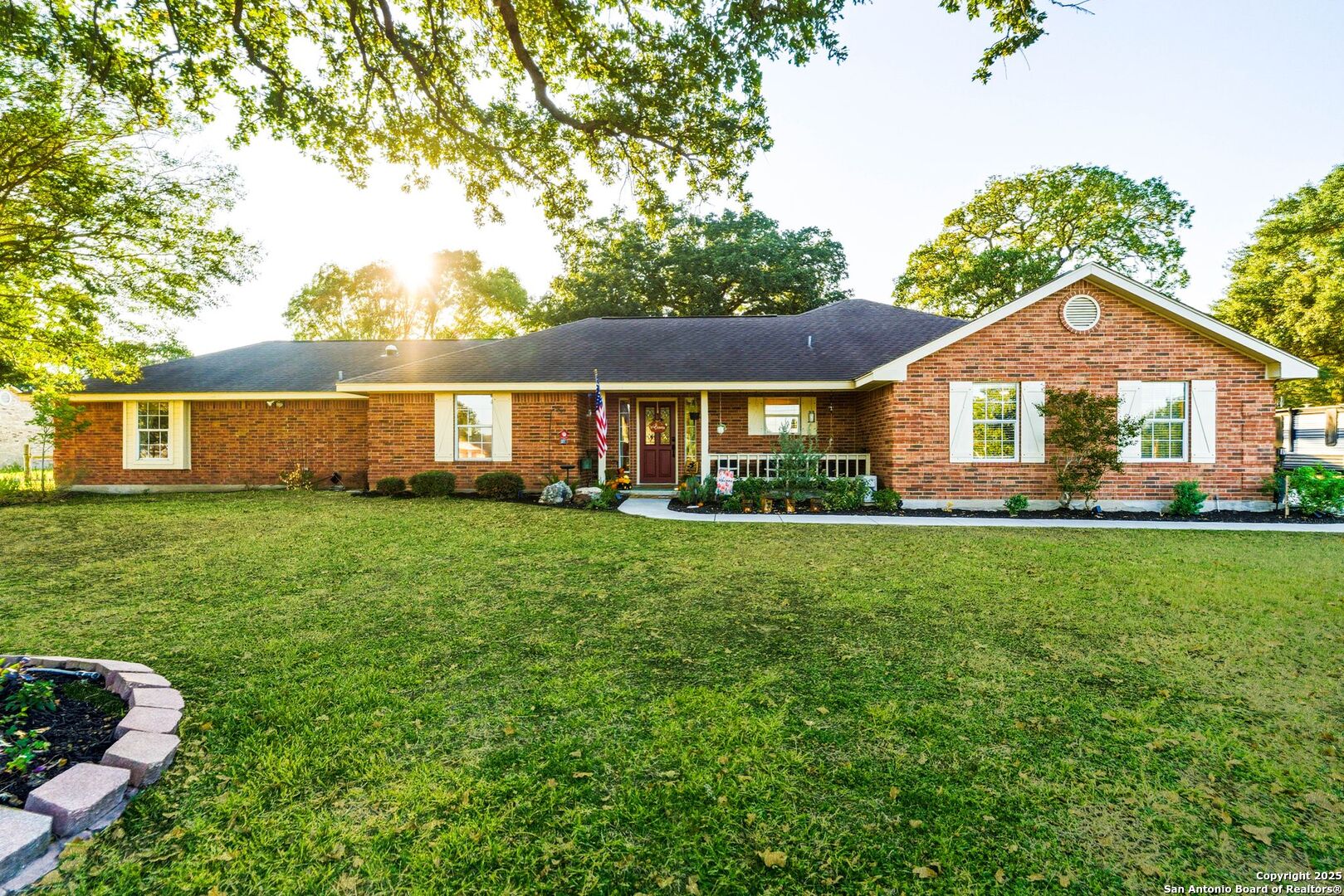 1265 Hillside Oaks Drive La Vernia, TX 78121 - Photo 1 of 72 a front view of a house with a yard