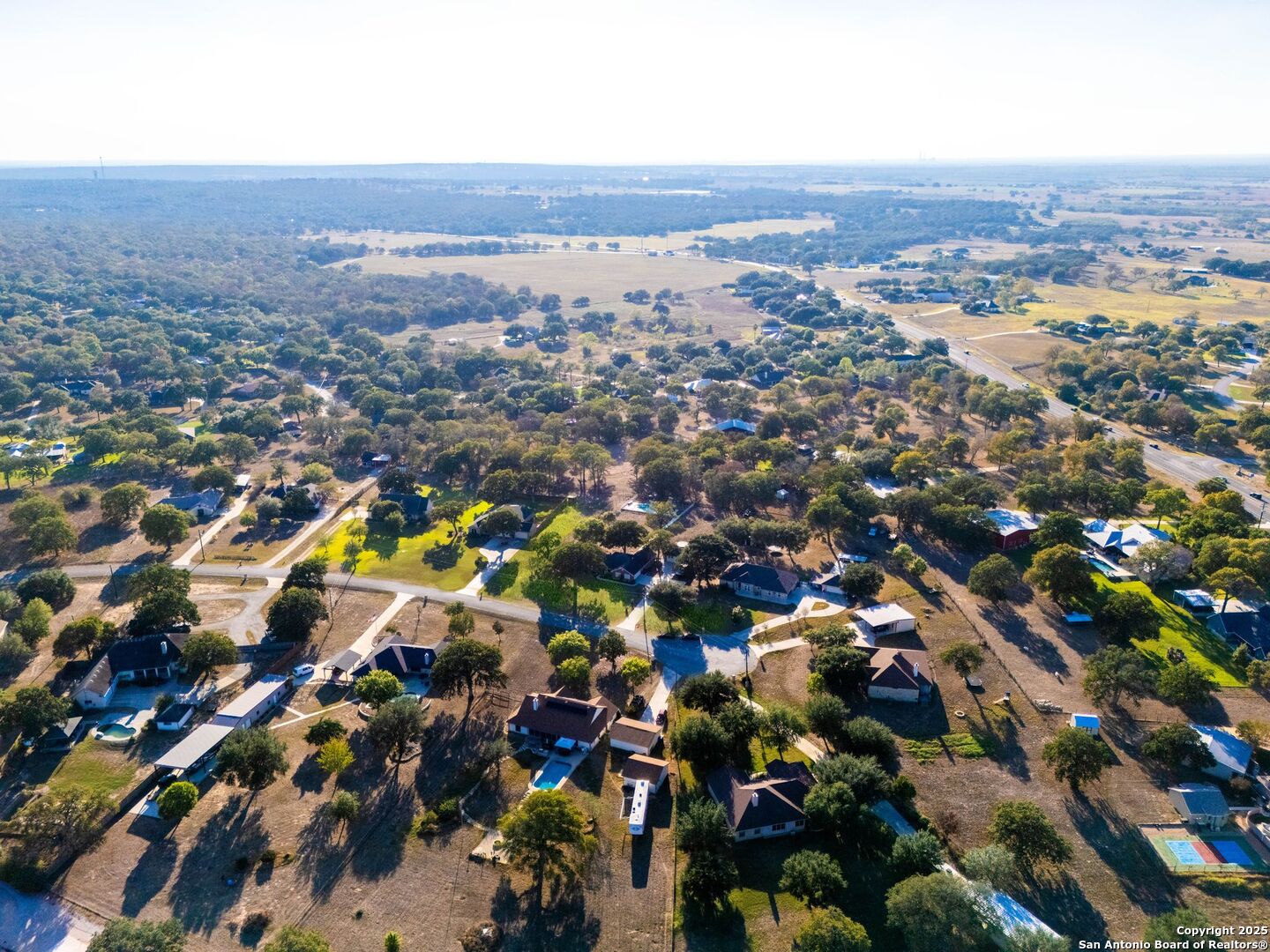 1265 Hillside Oaks Drive La Vernia, TX 78121 - Photo 37 of 72 an aerial view of residential houses with outdoor space