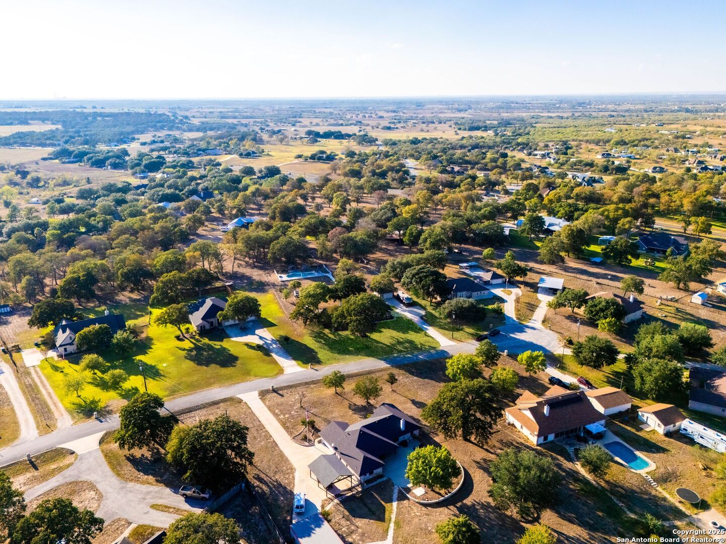 1265 Hillside Oaks Drive La Vernia, TX 78121 - Photo 40 of 72 an aerial view of residential houses with outdoor space