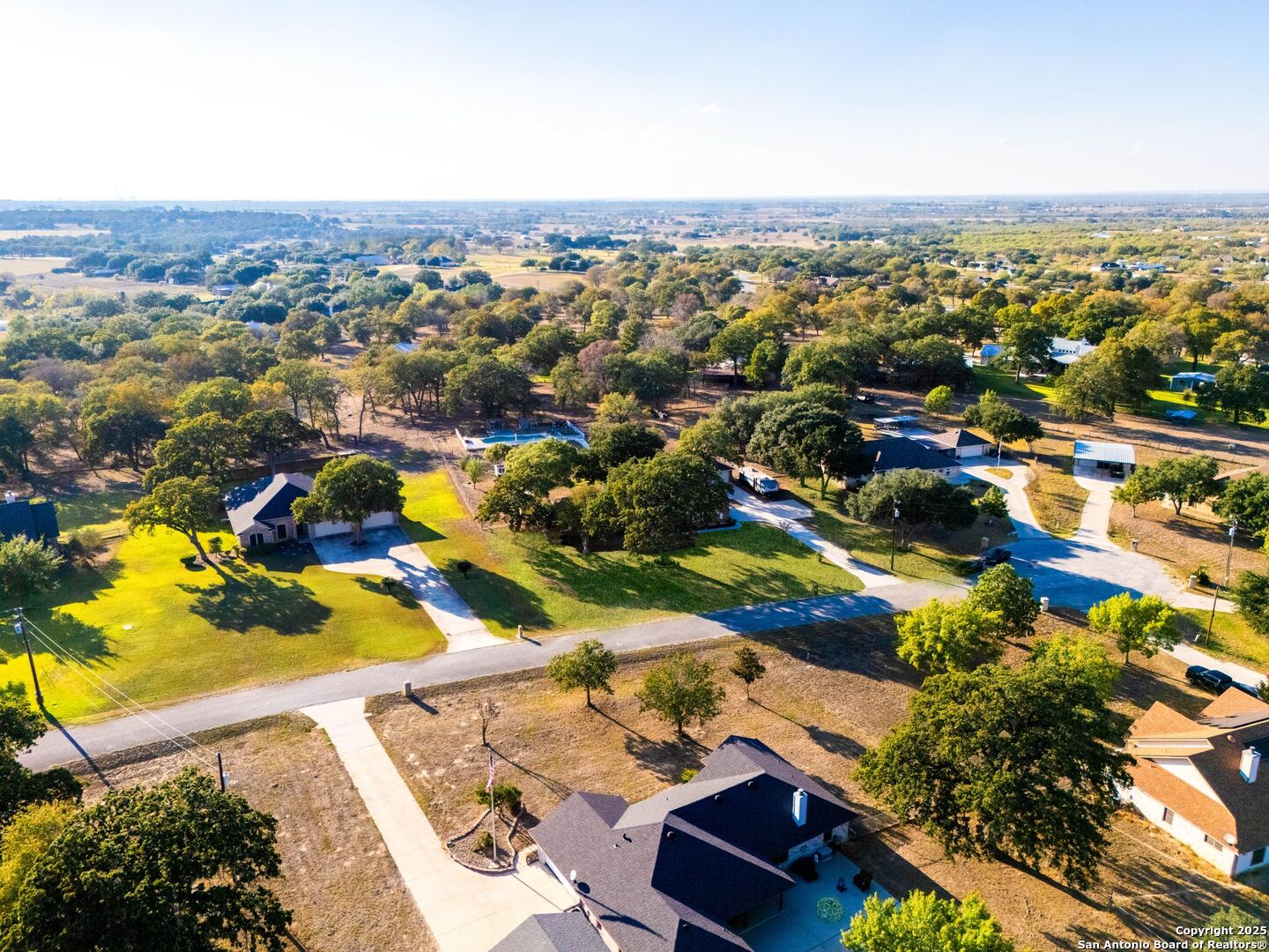 1265 Hillside Oaks Drive La Vernia, TX 78121 - Photo 41 of 72 an aerial view of residential houses with outdoor space