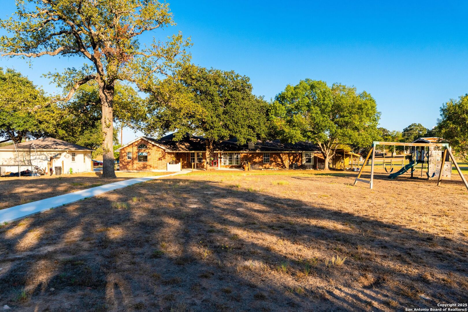 1265 Hillside Oaks Drive La Vernia, TX 78121 - Photo 52 of 72 a view of road with trees
