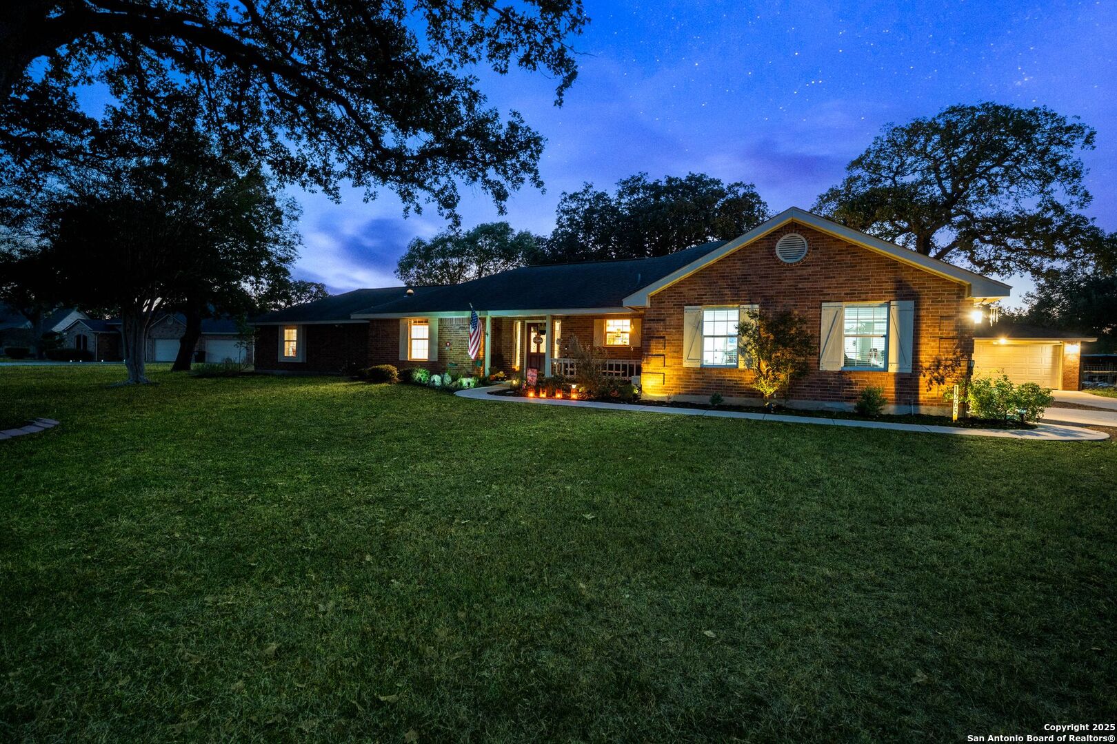 1265 Hillside Oaks Drive La Vernia, TX 78121 - Photo 60 of 72 a front view of a house with a yard