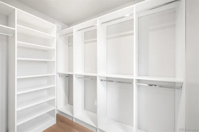 a view of an empty walk in closet