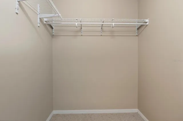 a view of a room with racks on the wall