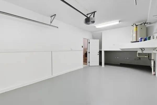 a view of room and kitchen