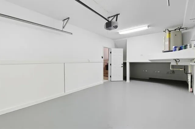 a view of room and kitchen