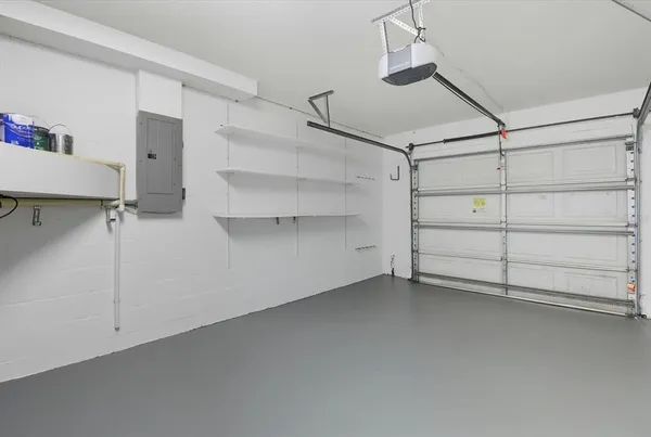a view of a room with storage and racks on the wall