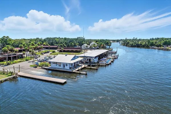 a view of a lake with outside seating space