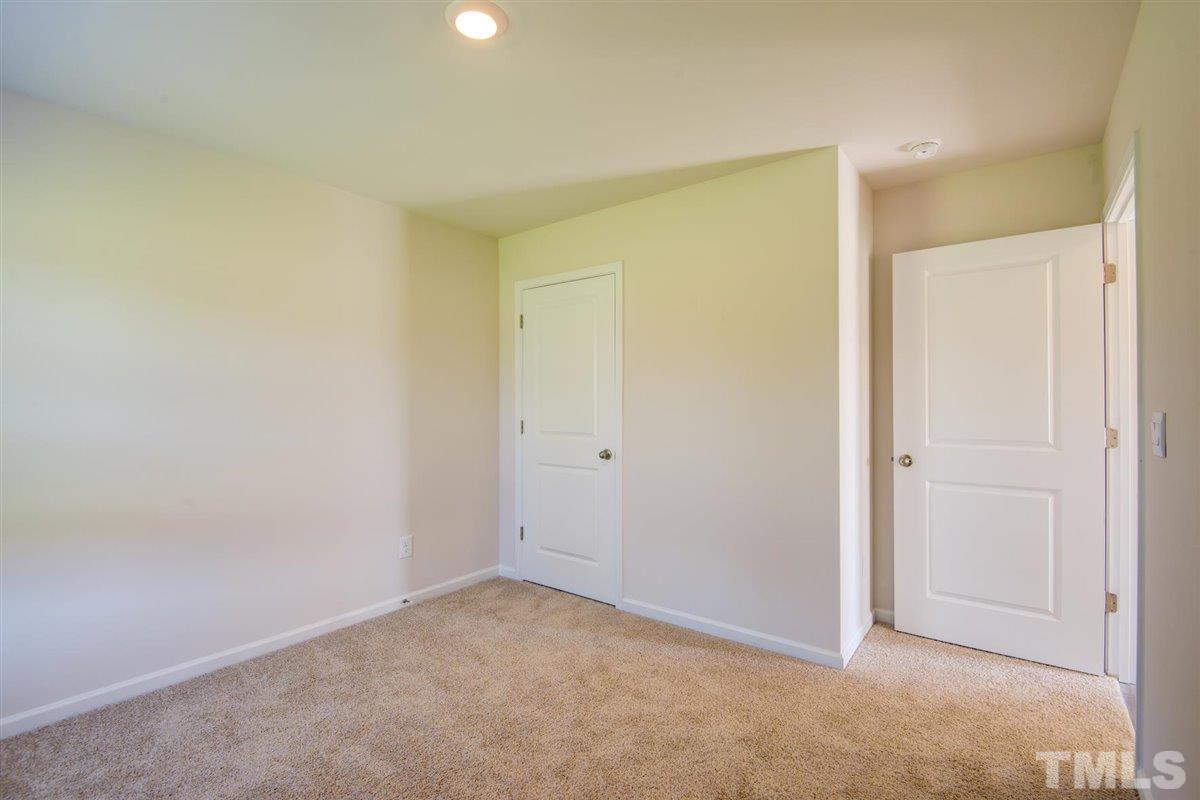7653 Sand Pit Road Stantonsburg, NC 27883 - Photo 7 of 28 a view of an empty room