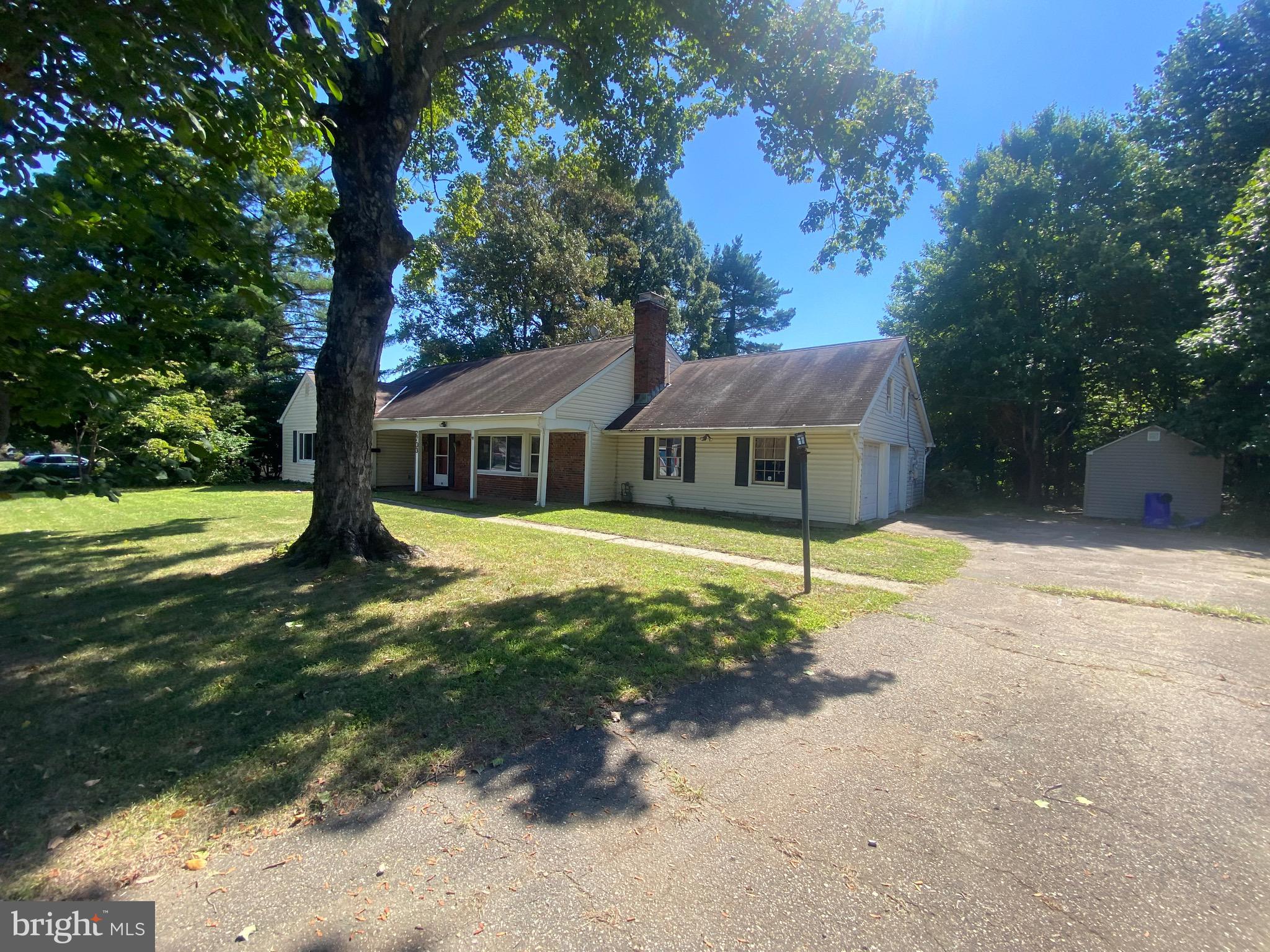 2703 Lyn Place Bowie, MD 20715 - Photo 3 of 14 a front view of a house with garden