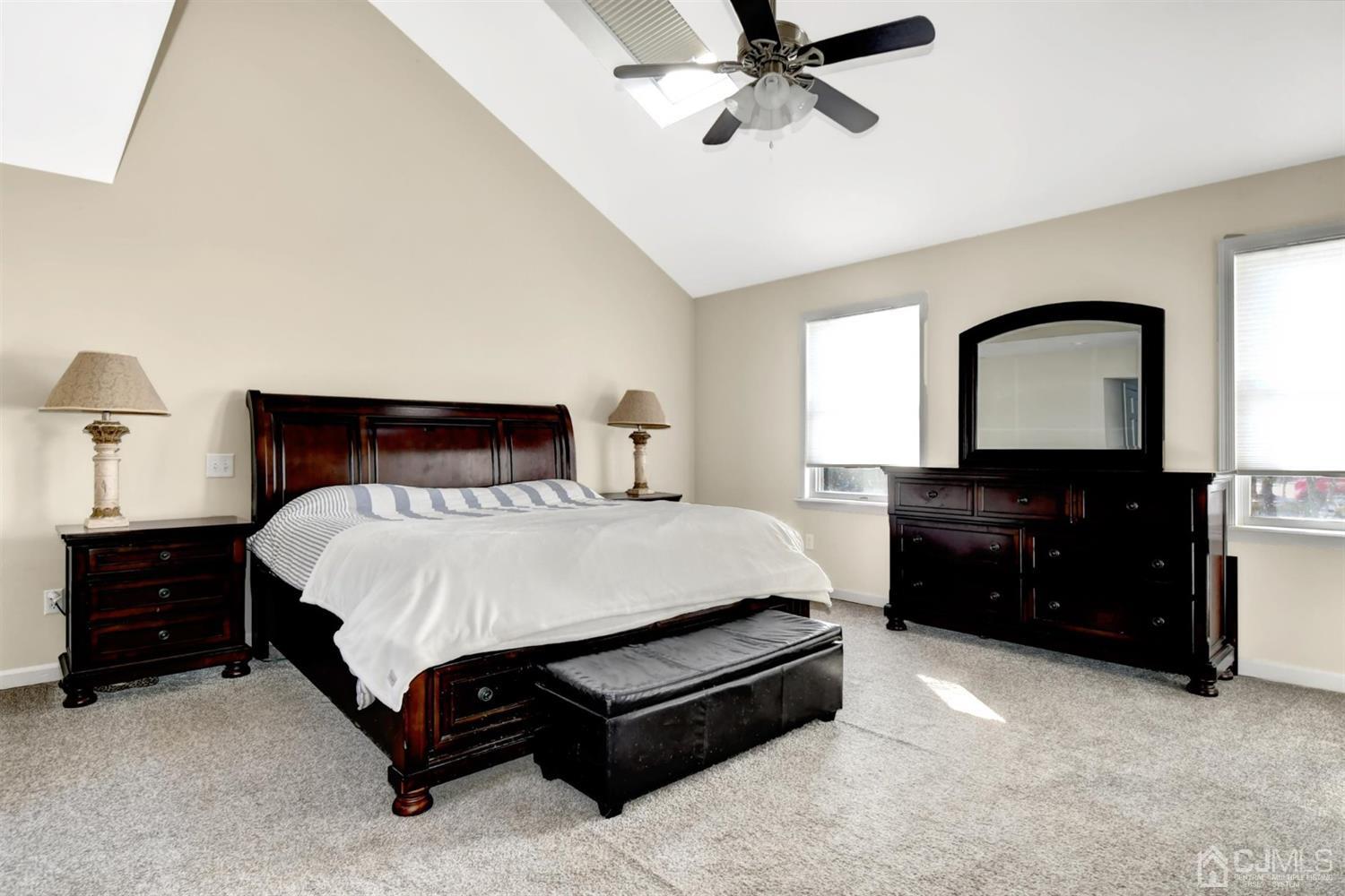 365 Cedar Swamp Road Jackson, NJ 08527 - Photo 18 of 38 a bedroom with a bed and a dresser