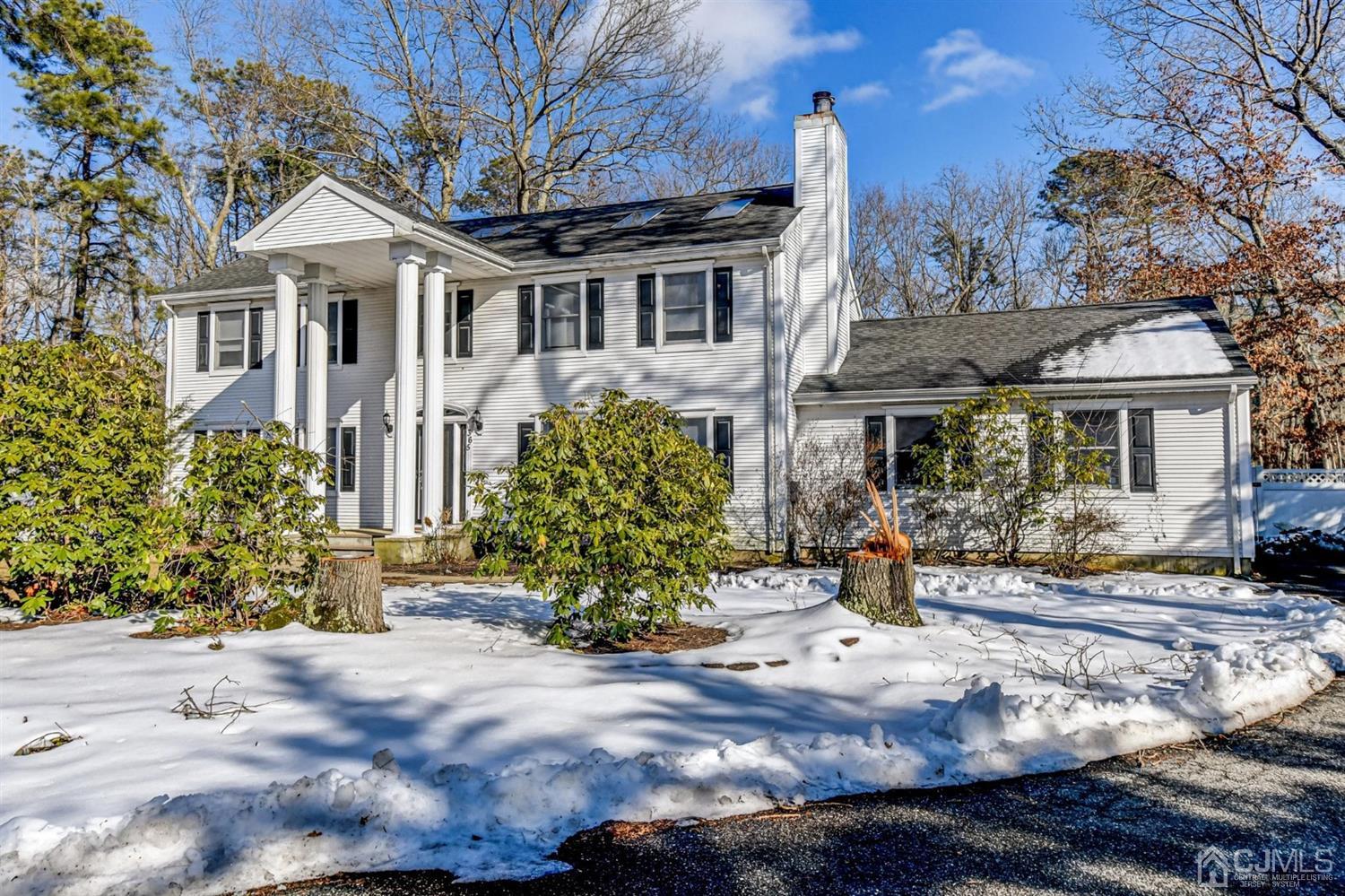 365 Cedar Swamp Road Jackson, NJ 08527 - Photo 3 of 38 a front view of a house with a yard