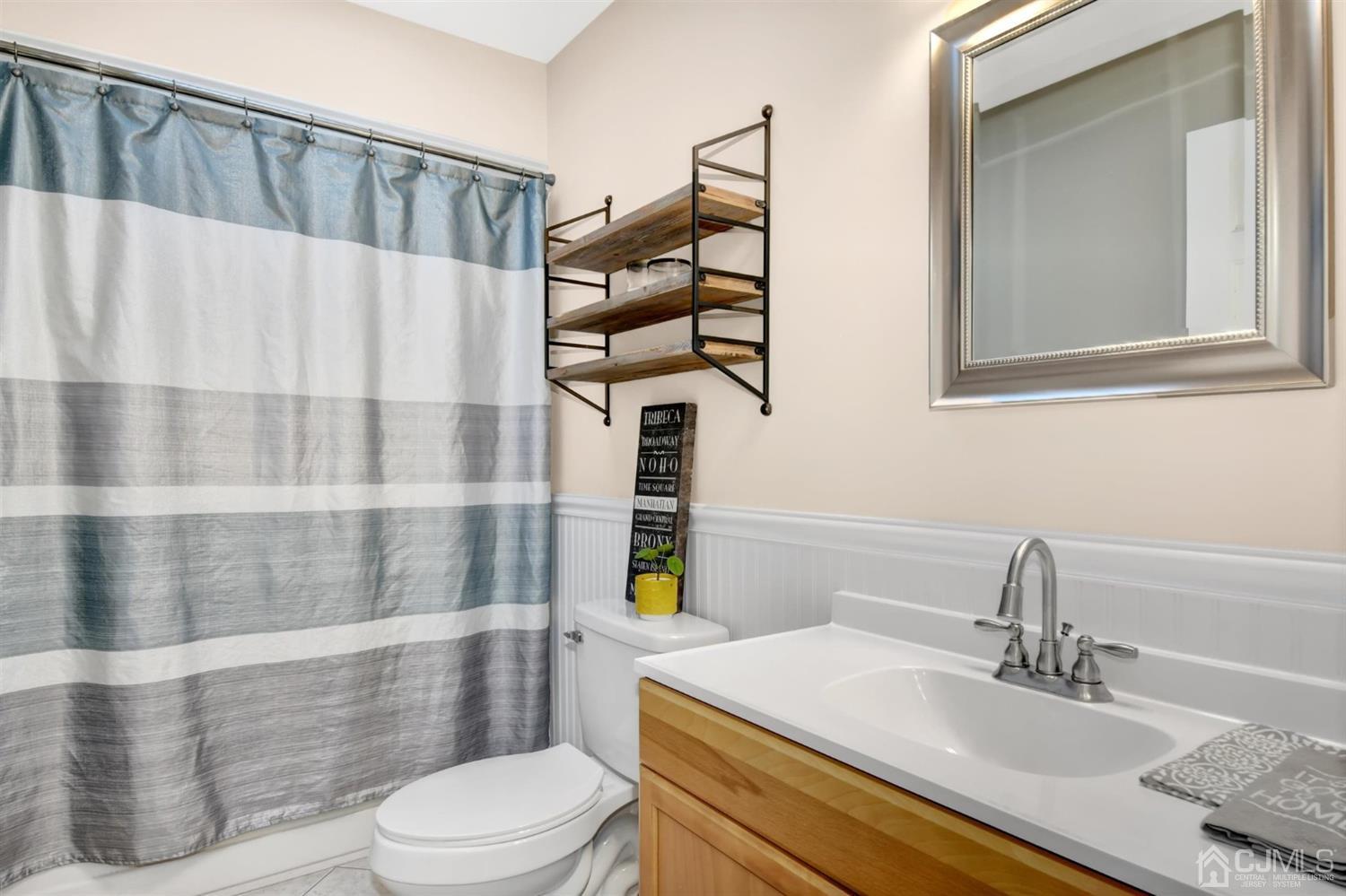 365 Cedar Swamp Road Jackson, NJ 08527 - Photo 21 of 38 a bathroom with a sink a toilet and shower