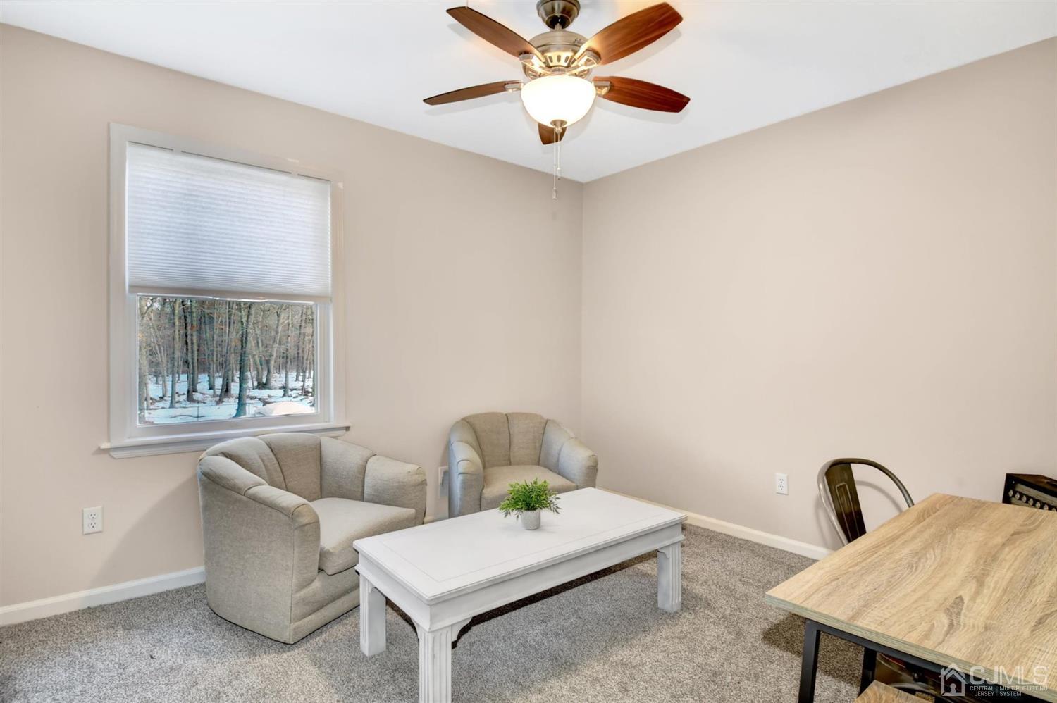 365 Cedar Swamp Road Jackson, NJ 08527 - Photo 23 of 38 a living room with furniture and window