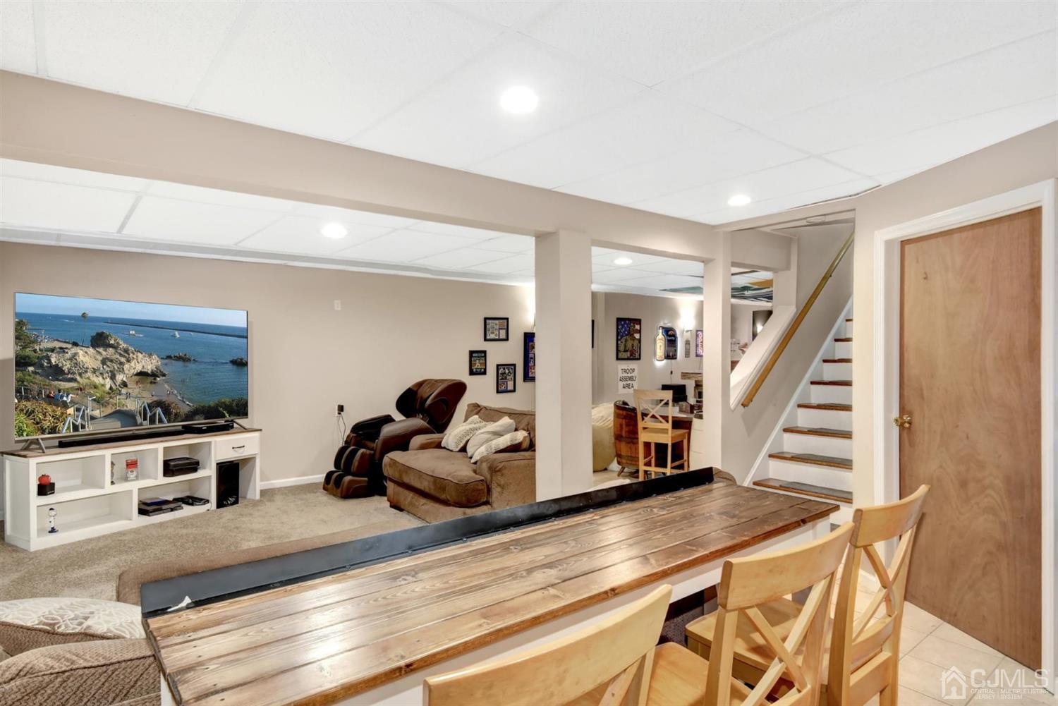 365 Cedar Swamp Road Jackson, NJ 08527 - Photo 27 of 38 a view of a room with wooden floor and stairs