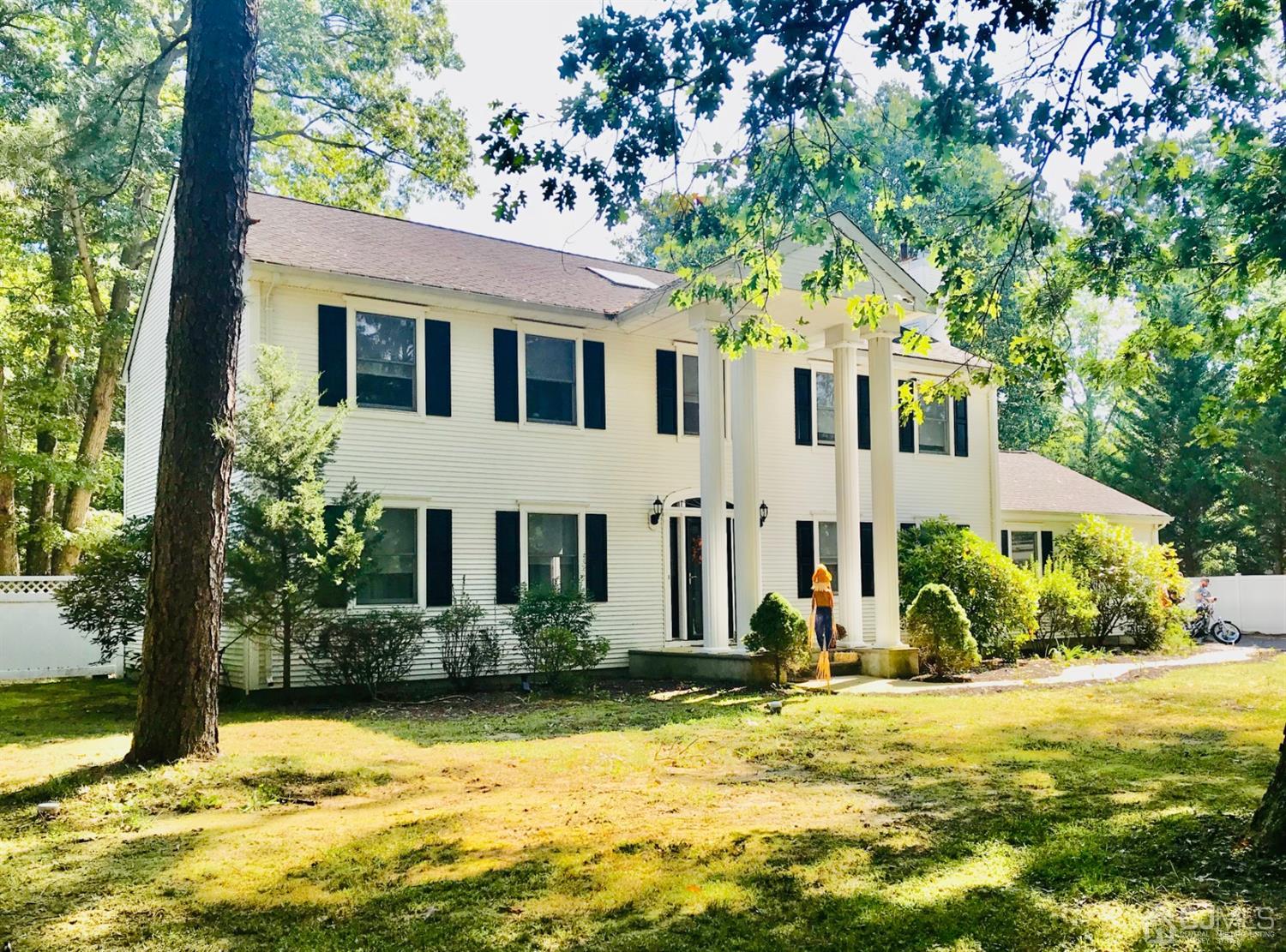 365 Cedar Swamp Road Jackson, NJ 08527 - Photo 38 of 38 a front view of a house with a yard