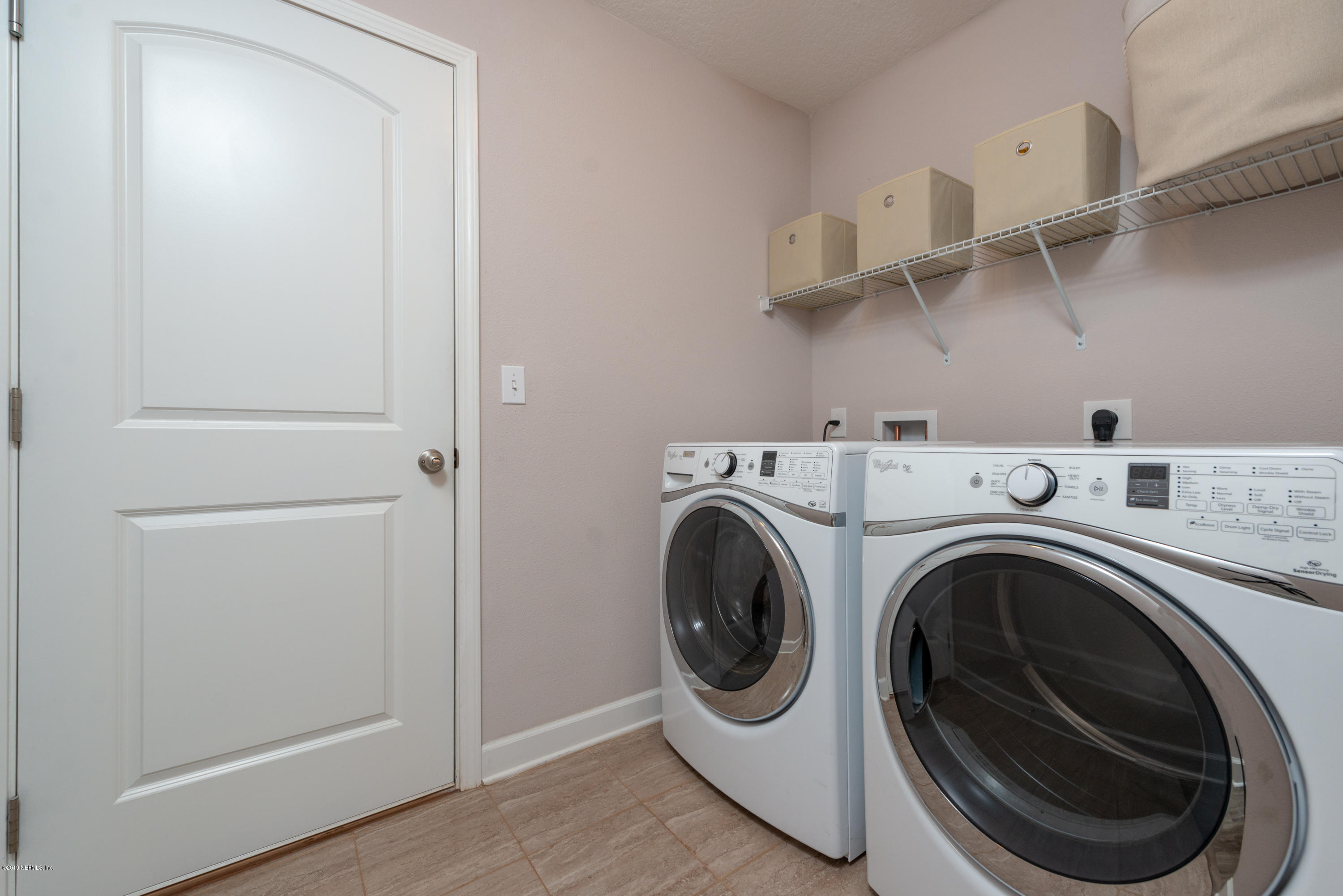 824 Queen Road St. Augustine, FL 32086 - Photo 22 of 35 a utility room with dryer and washer
