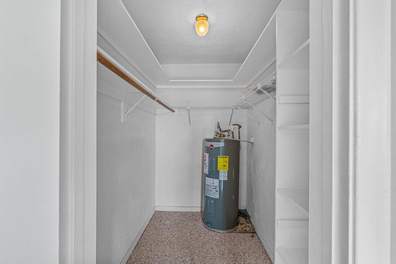 299 Southwest 7th Street, Unit 2060 Boca Raton, FL 33432 - Photo 14 of 20 a view of a storage & utility room with a window