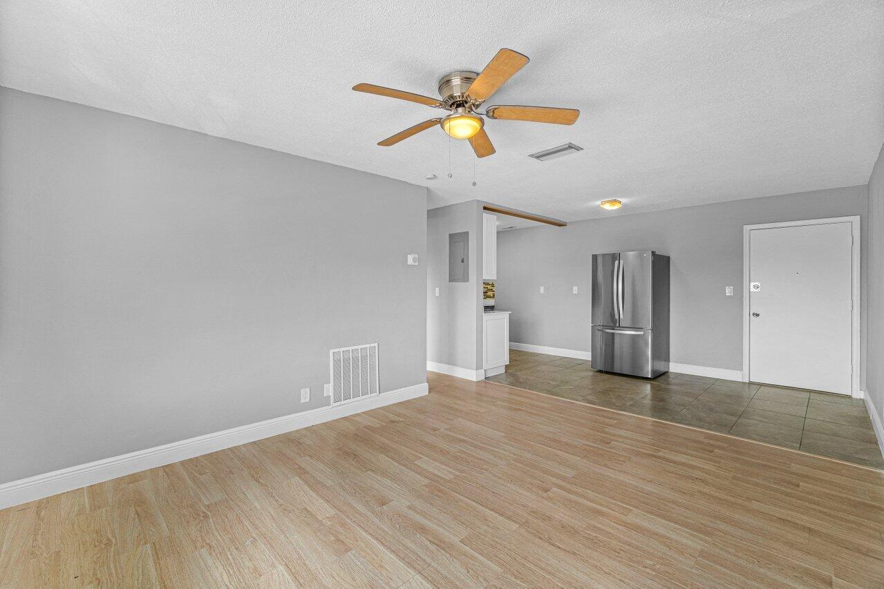 299 Southwest 7th Street, Unit 2060 Boca Raton, FL 33432 - Photo 10 of 20 a view of an empty room and window