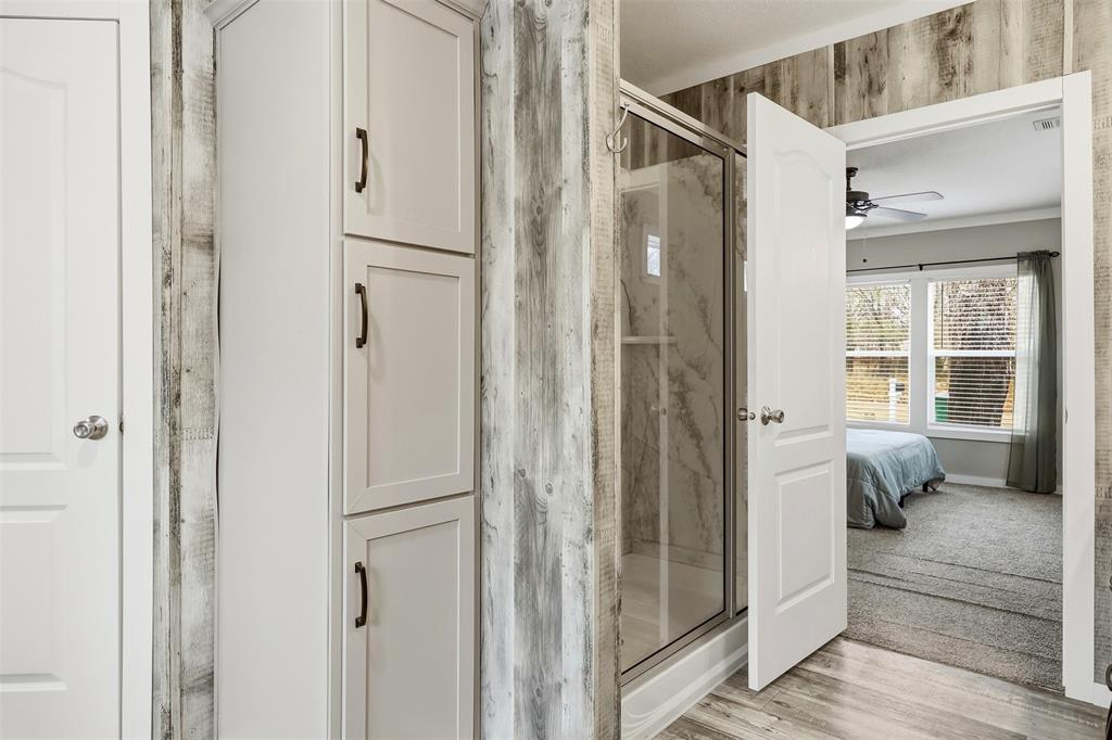 2114 Hickory Street Mabank, TX 75156 - Photo 14 of 31 Primary bathroom with separate shower