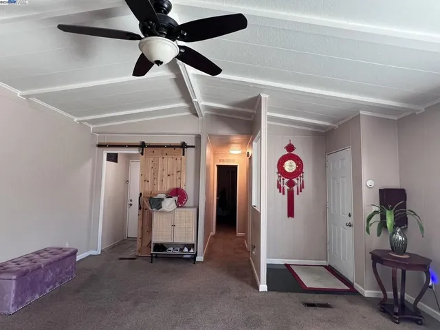 a view of a hallway with workspace