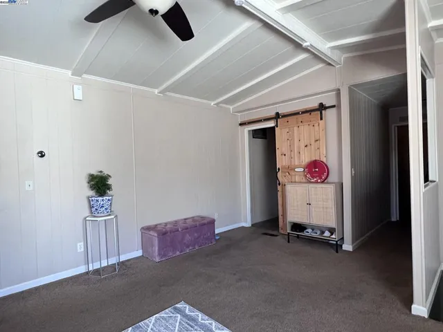 a room with toys and a ceiling fan