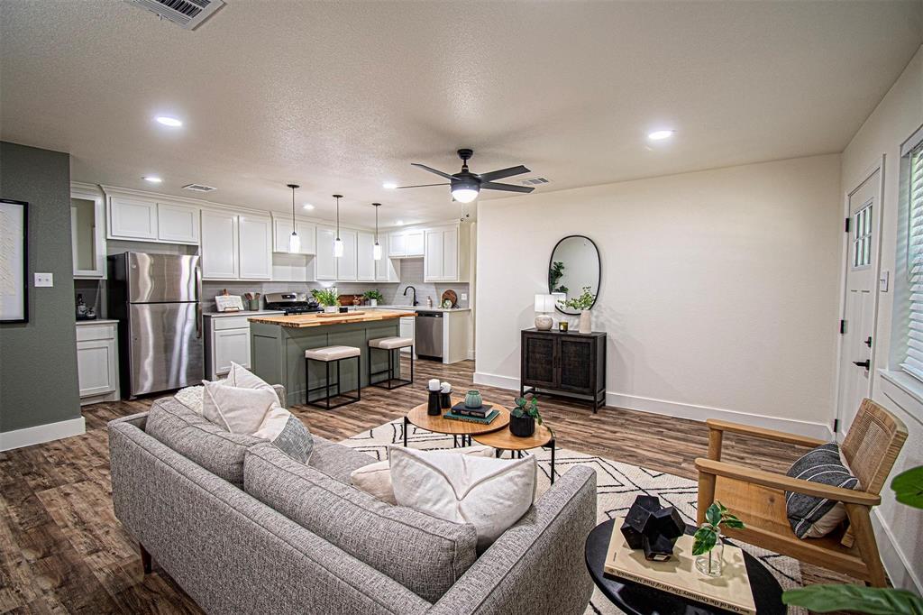 551 East Burks Street Pilot Point, TX 76258 - Photo 6 of 29 a living room with furniture and a wooden floor
