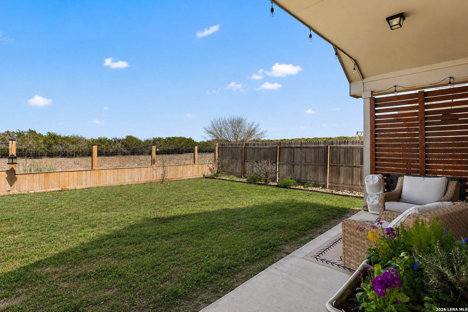 29739 Elkhorn Ridge Fair Oaks Ranch, TX 78015 - Photo 34 of 47 a view of a backyard with sitting area