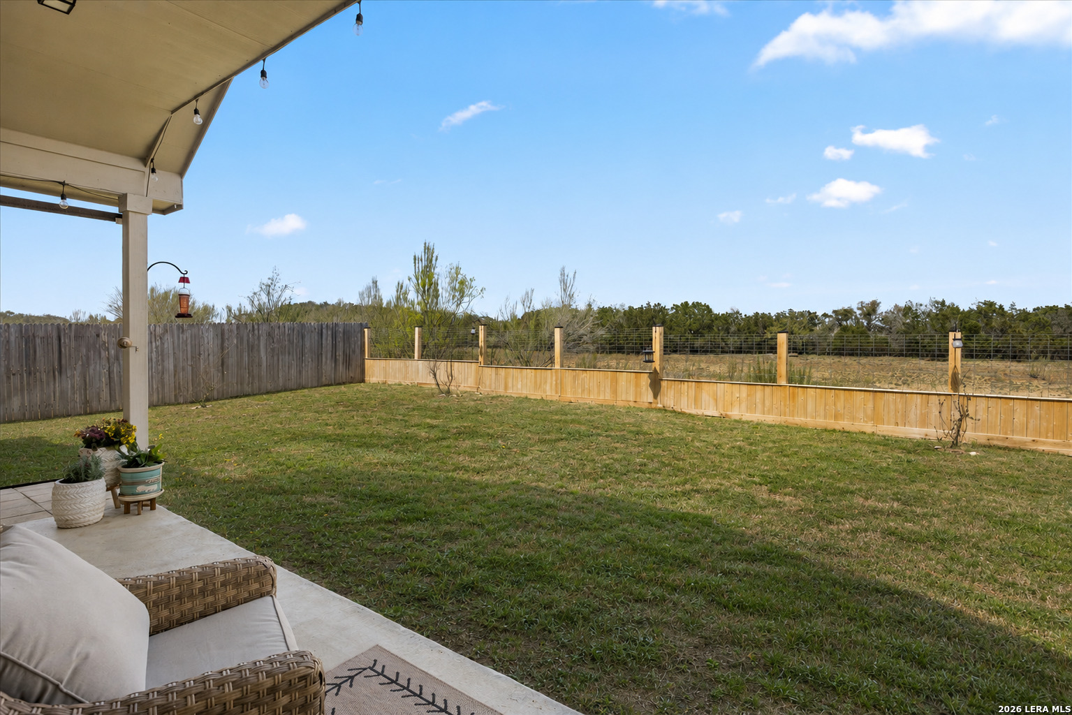29739 Elkhorn Ridge Fair Oaks Ranch, TX 78015 - Photo 35 of 47 a view of a patio with a table and chairs
