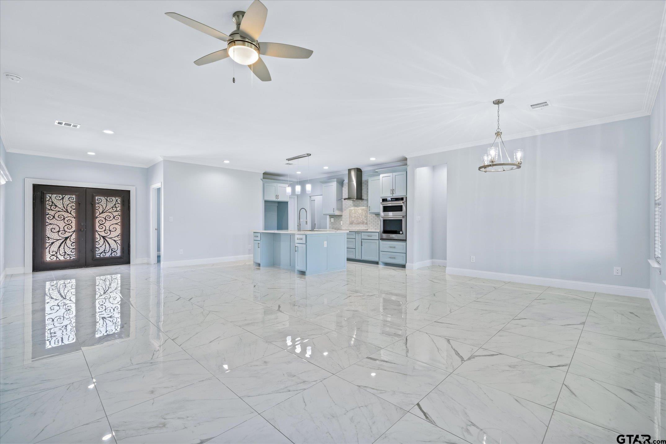 581 Imagine Drive Lindale, TX 75771 - Photo 12 of 35 a view of kitchen with furniture and ceiling fan