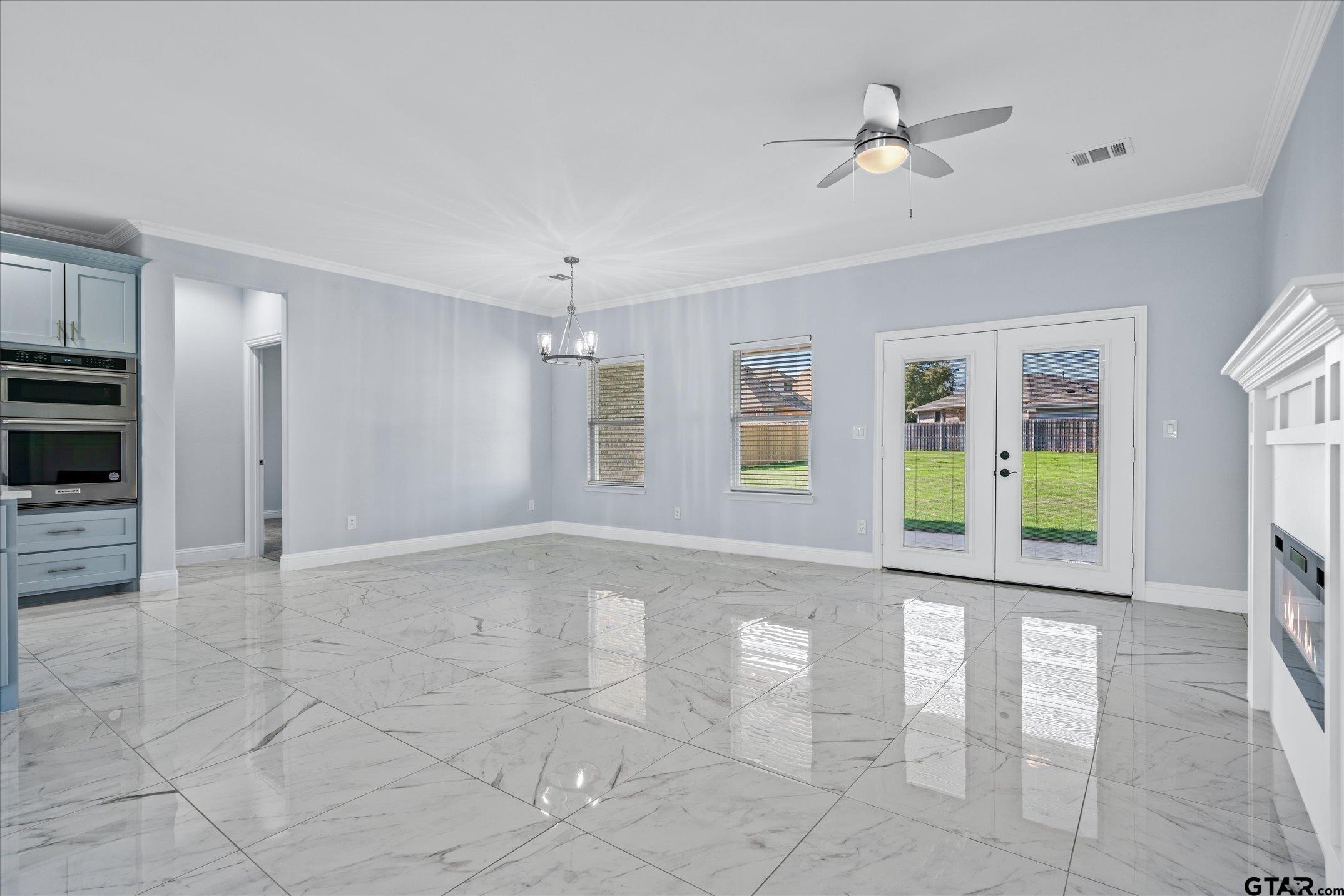 581 Imagine Drive Lindale, TX 75771 - Photo 14 of 35 a view of an empty room with a window