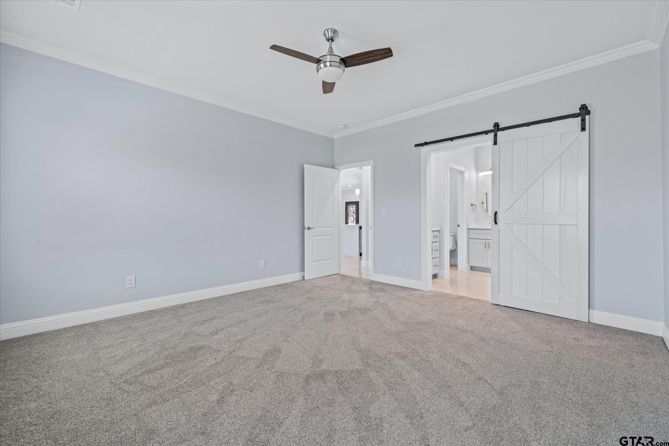 581 Imagine Drive Lindale, TX 75771 - Photo 17 of 35 a view of empty room with a ceiling fan