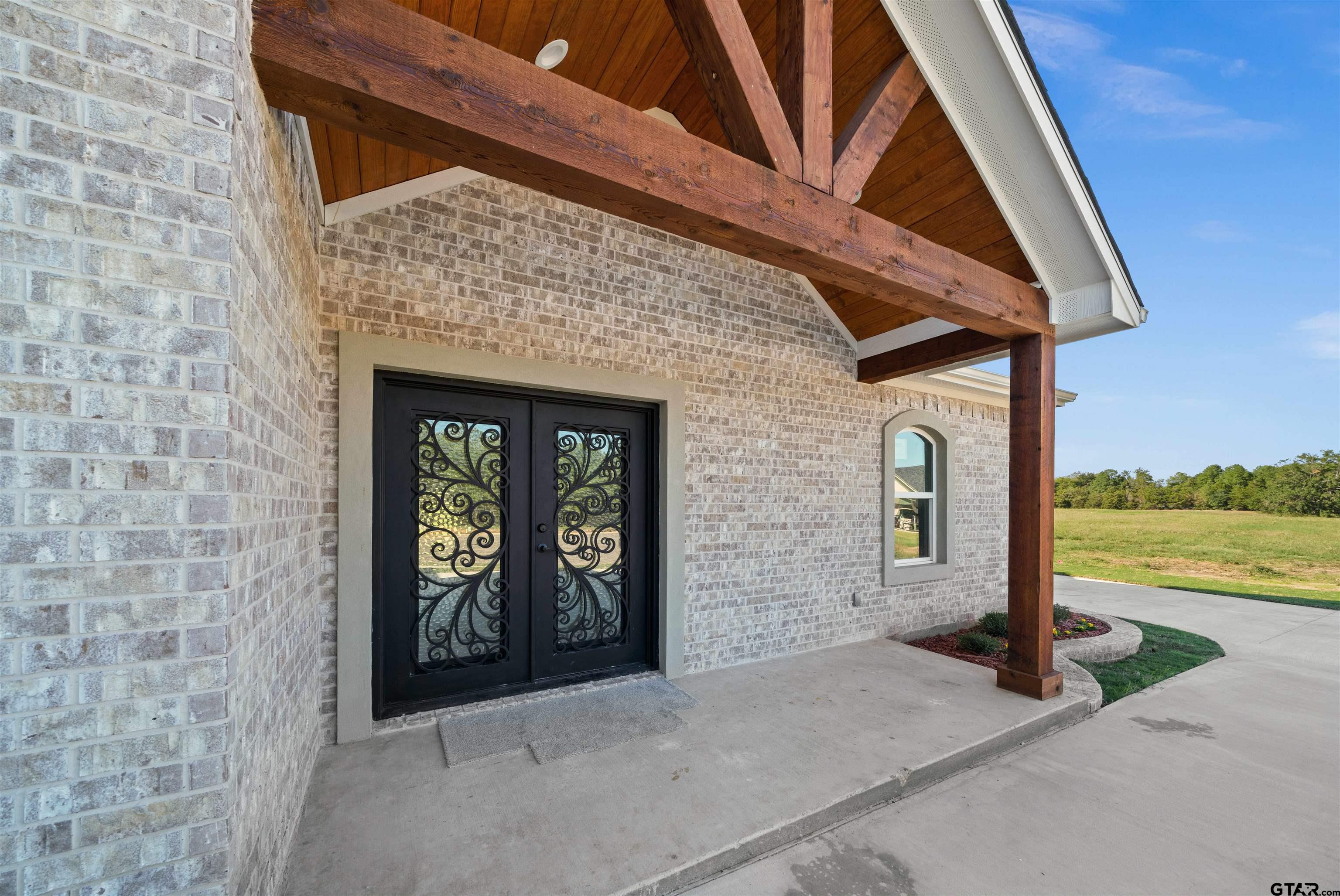 581 Imagine Drive Lindale, TX 75771 - Photo 3 of 35 a front view of a house with lake view