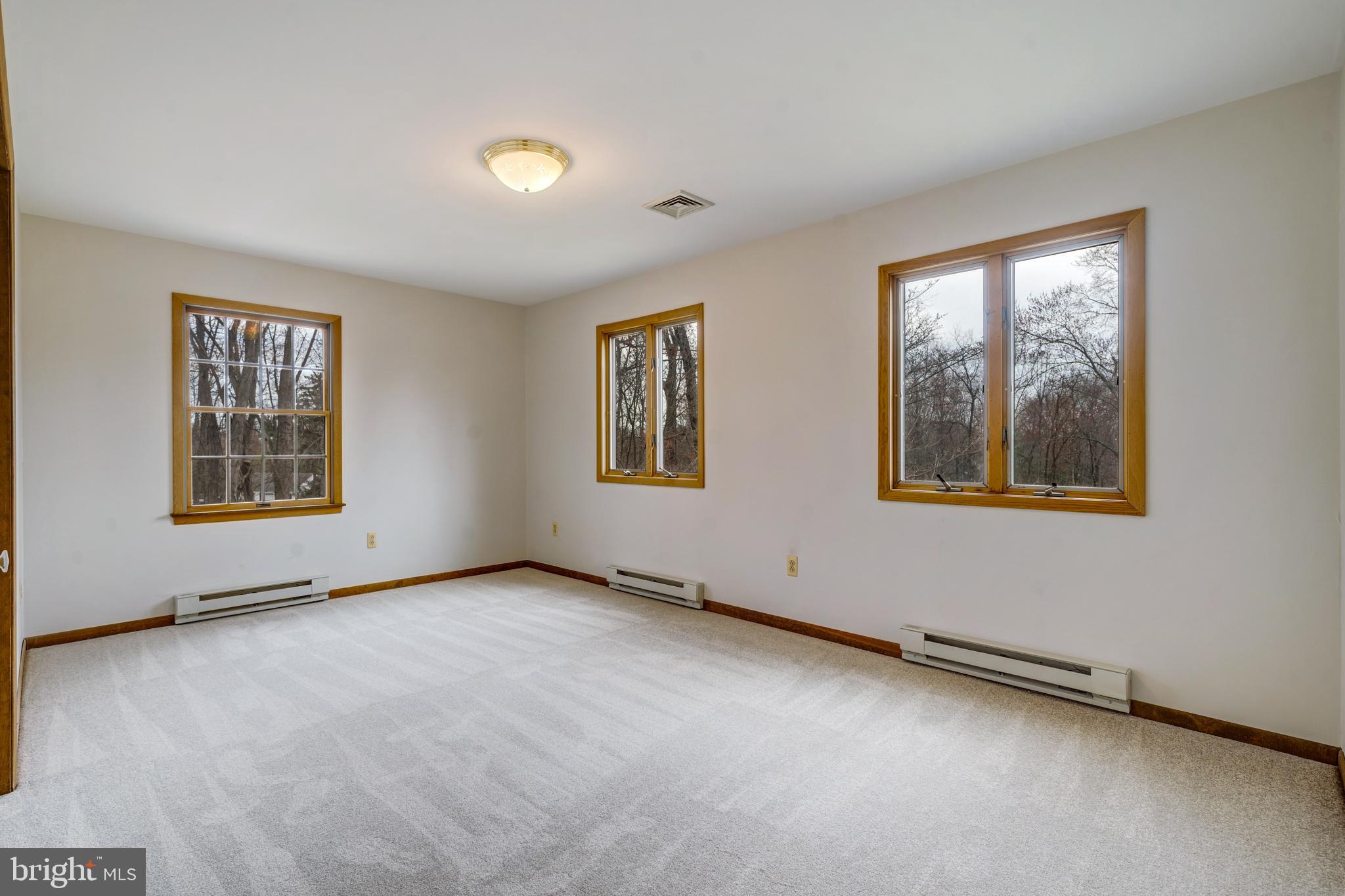 169 East Mountain Road Hillsborough, NJ 08844 - Photo 23 of 29 an empty room with windows