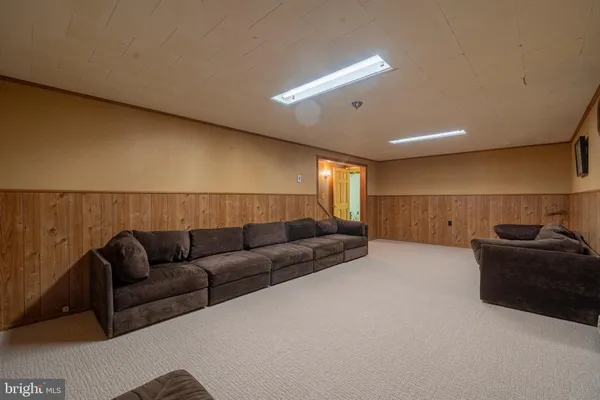 a living room with a couch and a couch