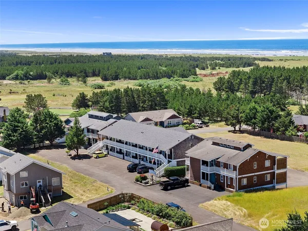 an aerial view of a house with outdoor space