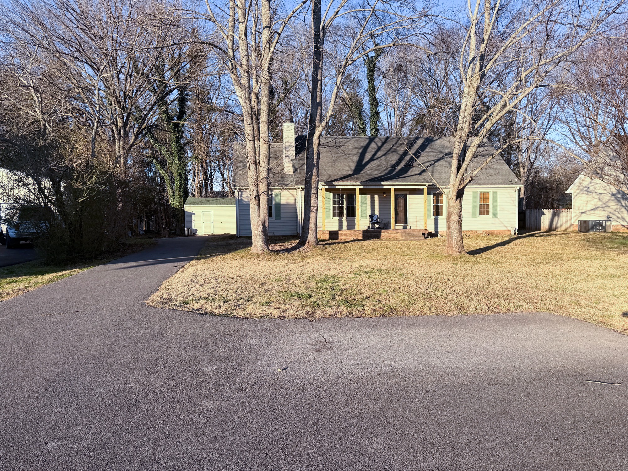 3012 Settlers Road Murfreesboro, TN 37129 - Photo 7 of 7 a large house with a large tree in front of it