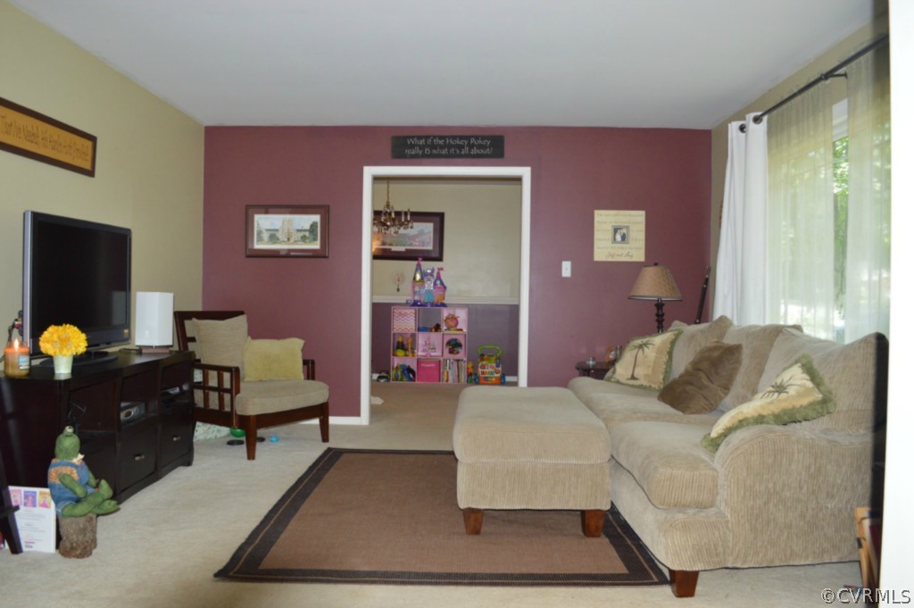 3650 Hemlock Road Chester, VA 23831 - Photo 2 of 12 a bedroom with a bed and window
