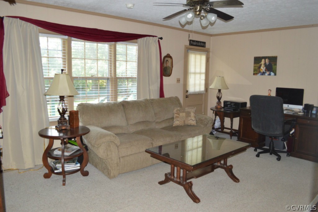 3650 Hemlock Road Chester, VA 23831 - Photo 3 of 12 a living room with furniture and a large window