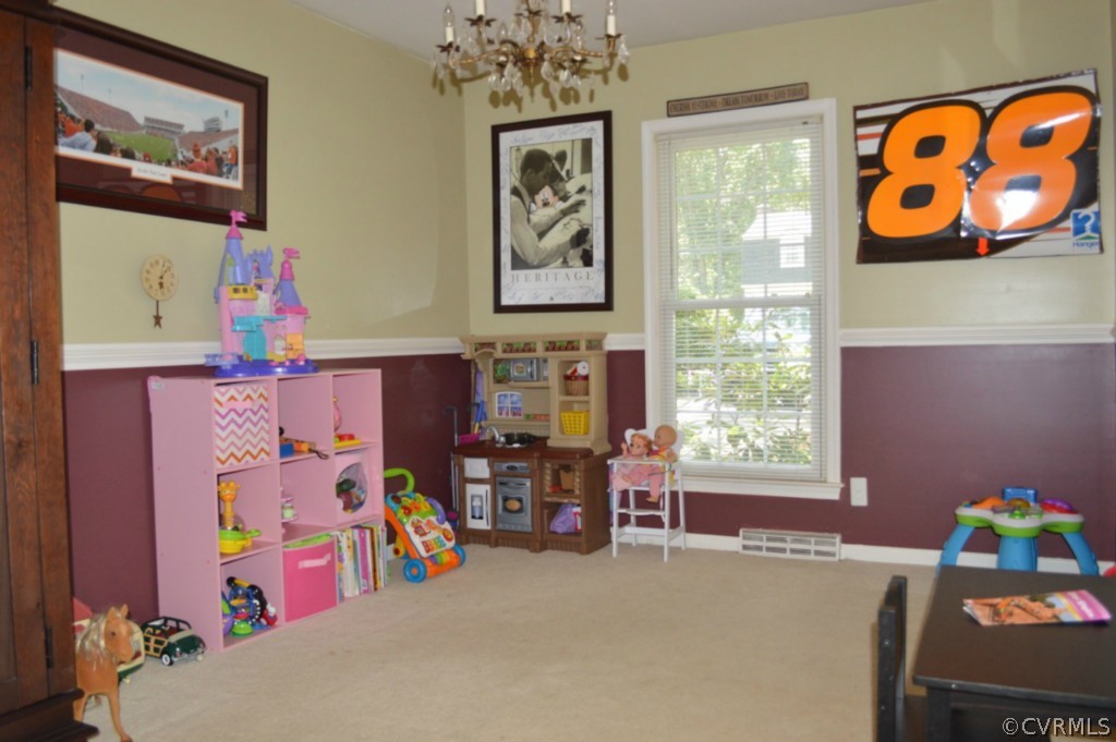 3650 Hemlock Road Chester, VA 23831 - Photo 4 of 12 a bed room with a bed and a couch