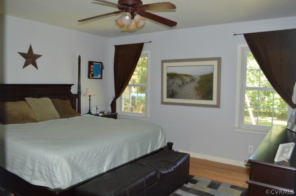 3650 Hemlock Road Chester, VA 23831 - Photo 6 of 12 a bedroom with a bed and window