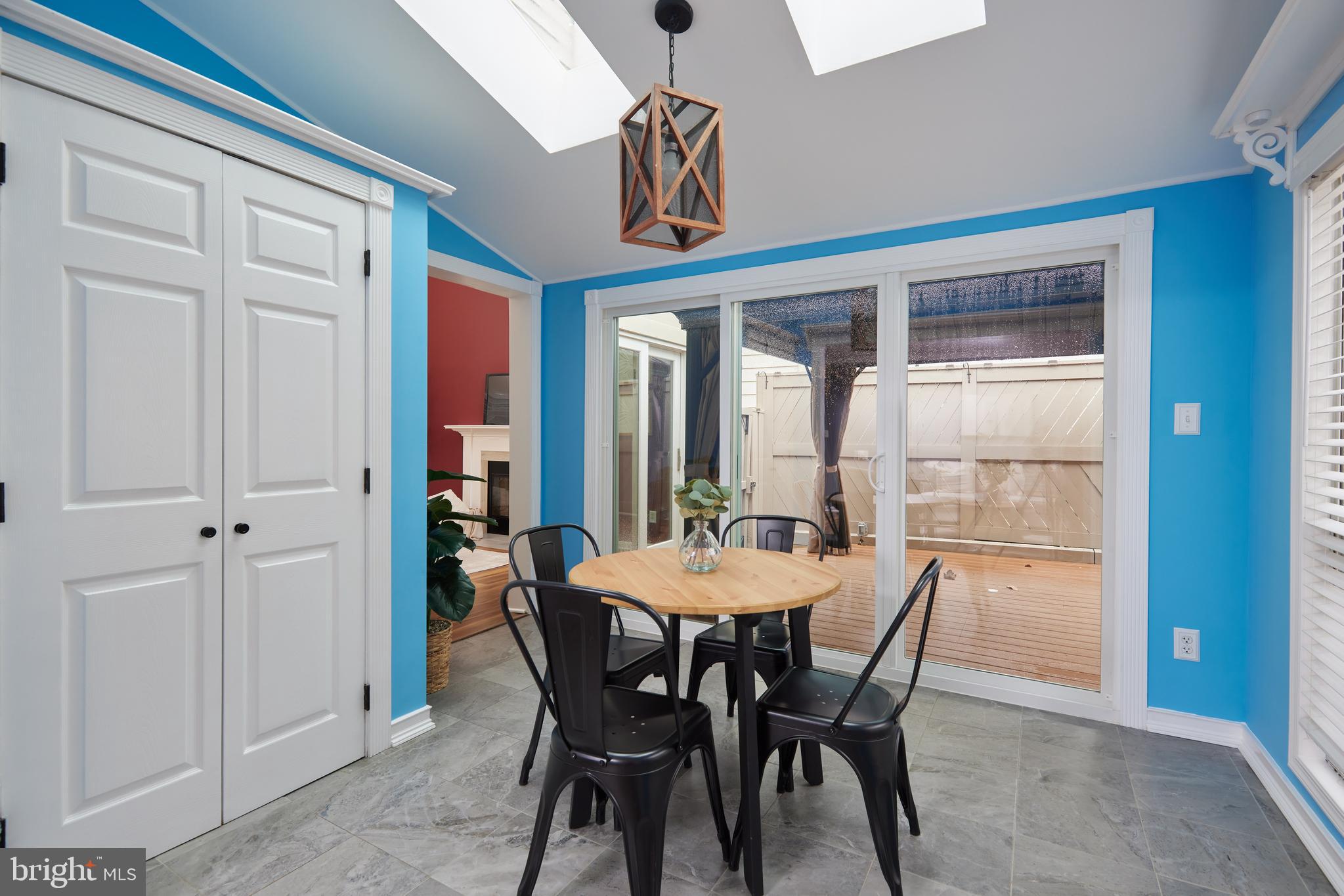 20100 Loading Rock Place Gaithersburg, MD 20886 - Photo 12 of 44 a view of a dining room with furniture window and wooden floor