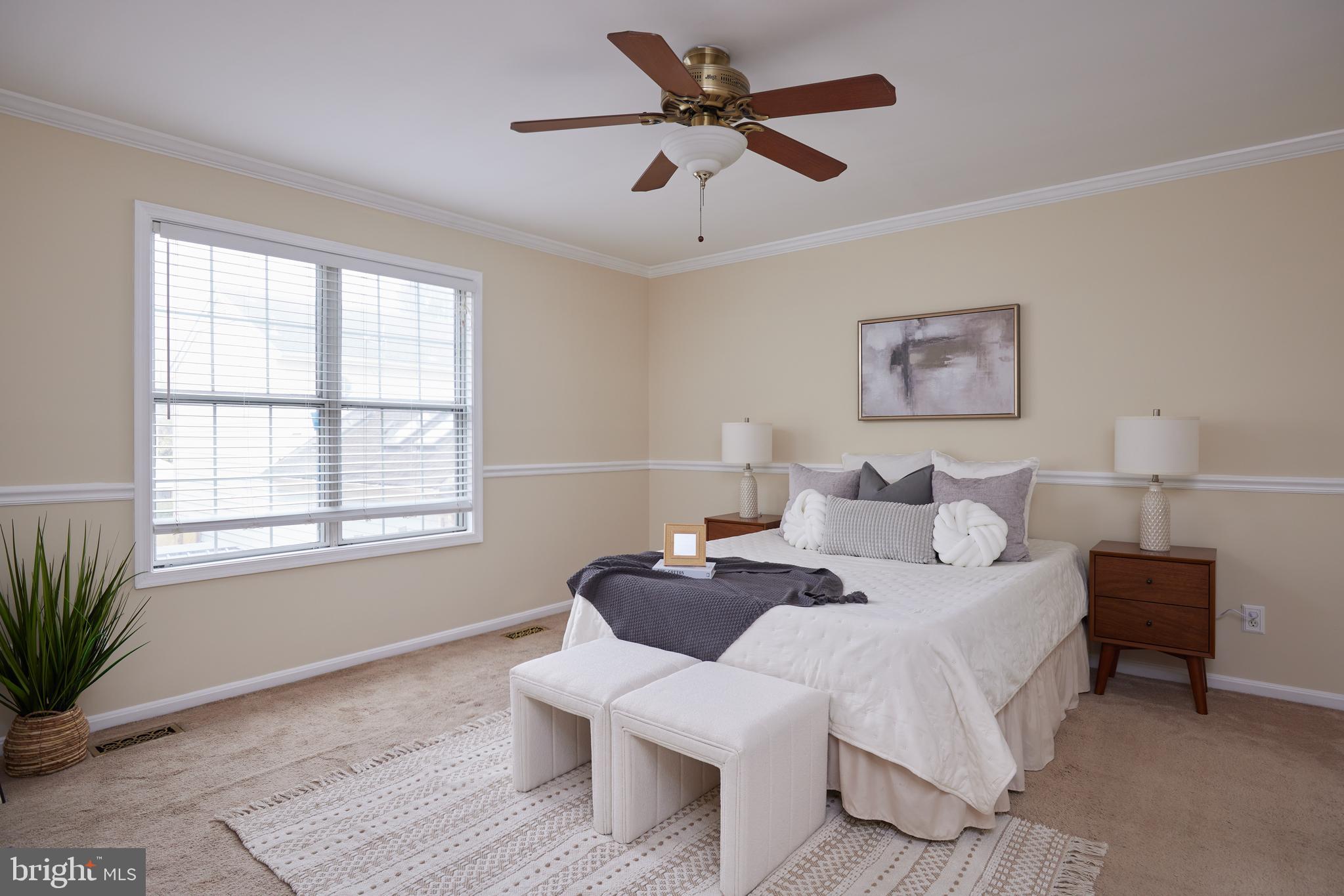 20100 Loading Rock Place Gaithersburg, MD 20886 - Photo 22 of 44 a room with a bed and a window
