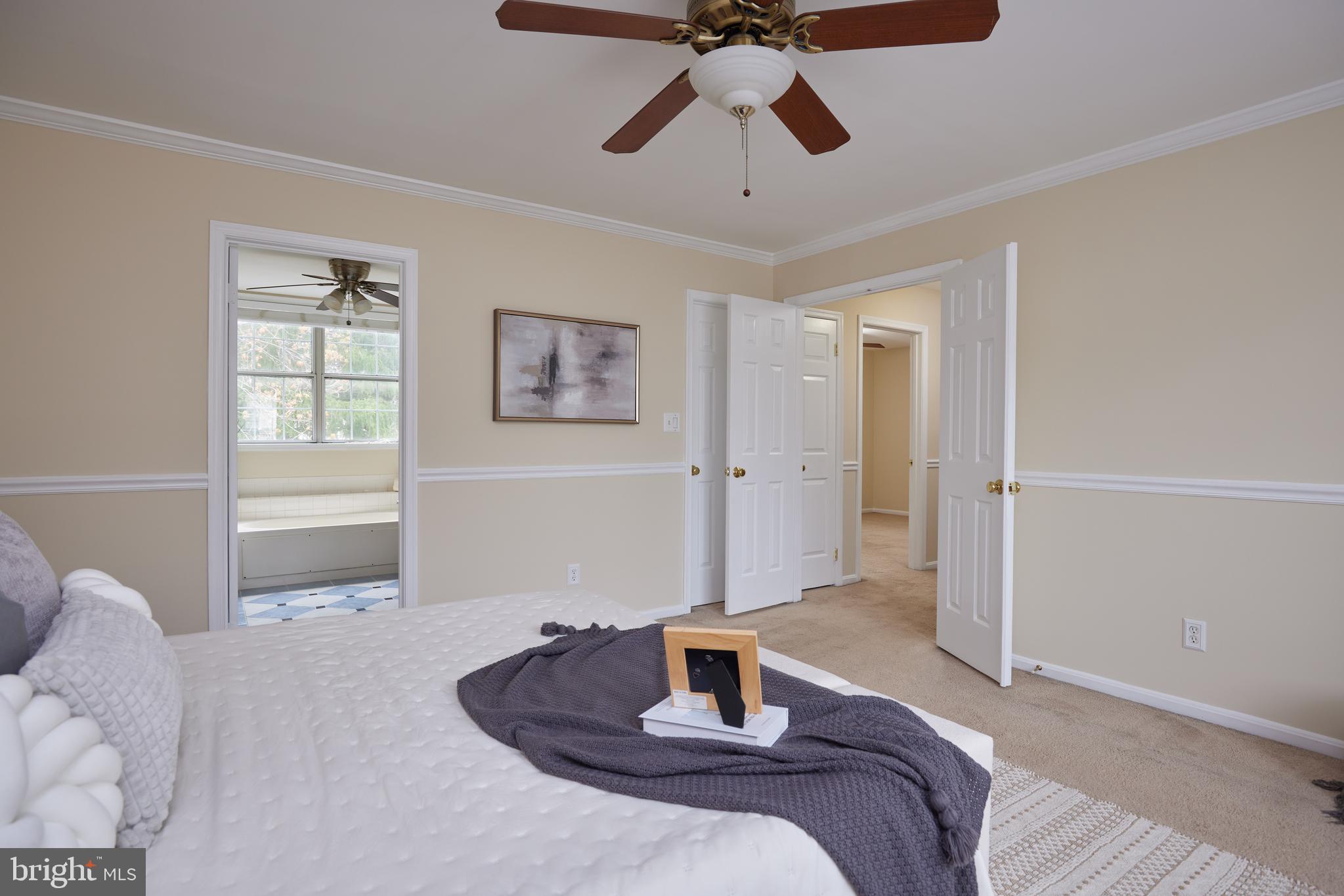 20100 Loading Rock Place Gaithersburg, MD 20886 - Photo 24 of 44 a bedroom with a bed and window