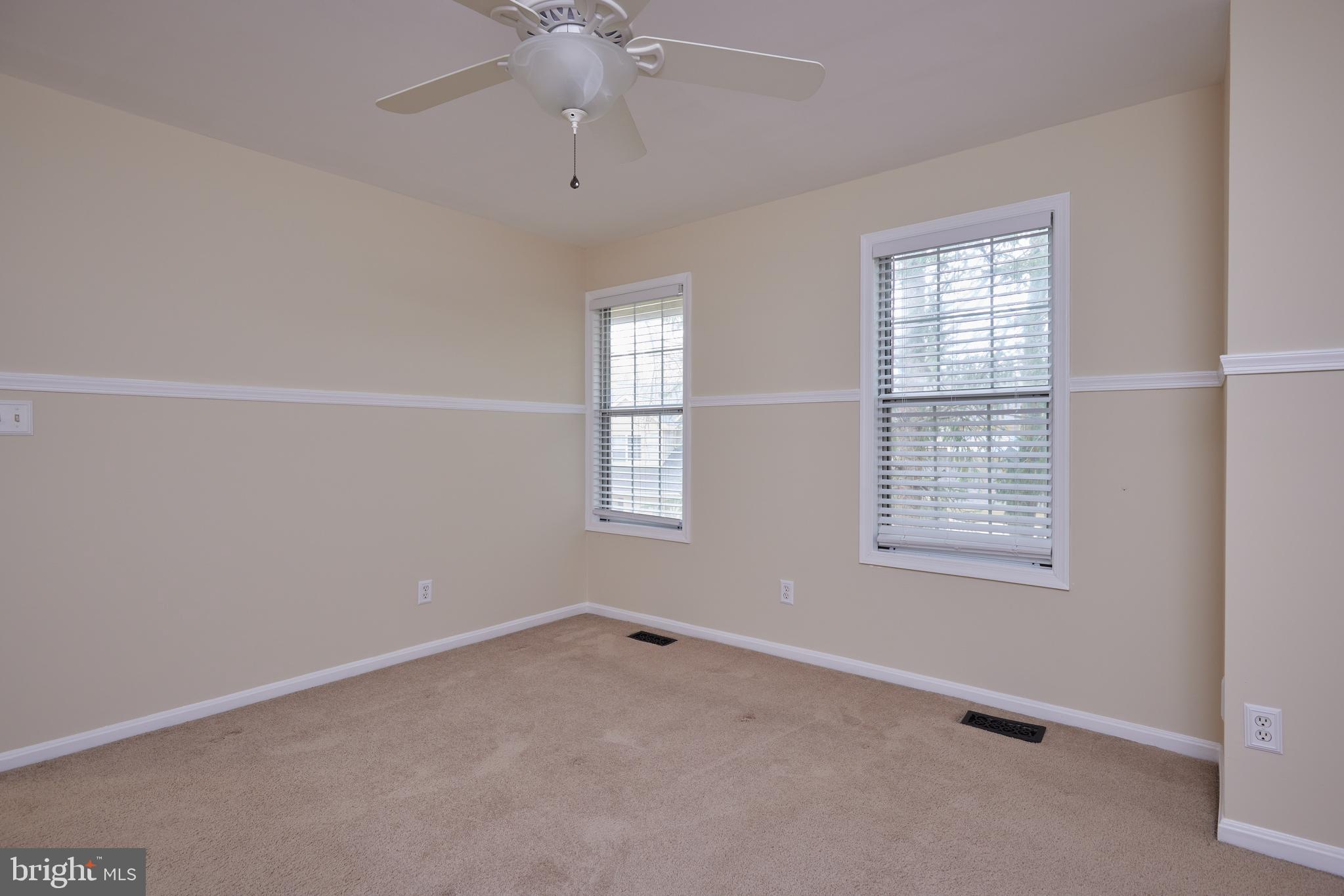 20100 Loading Rock Place Gaithersburg, MD 20886 - Photo 30 of 44 an empty room with a window
