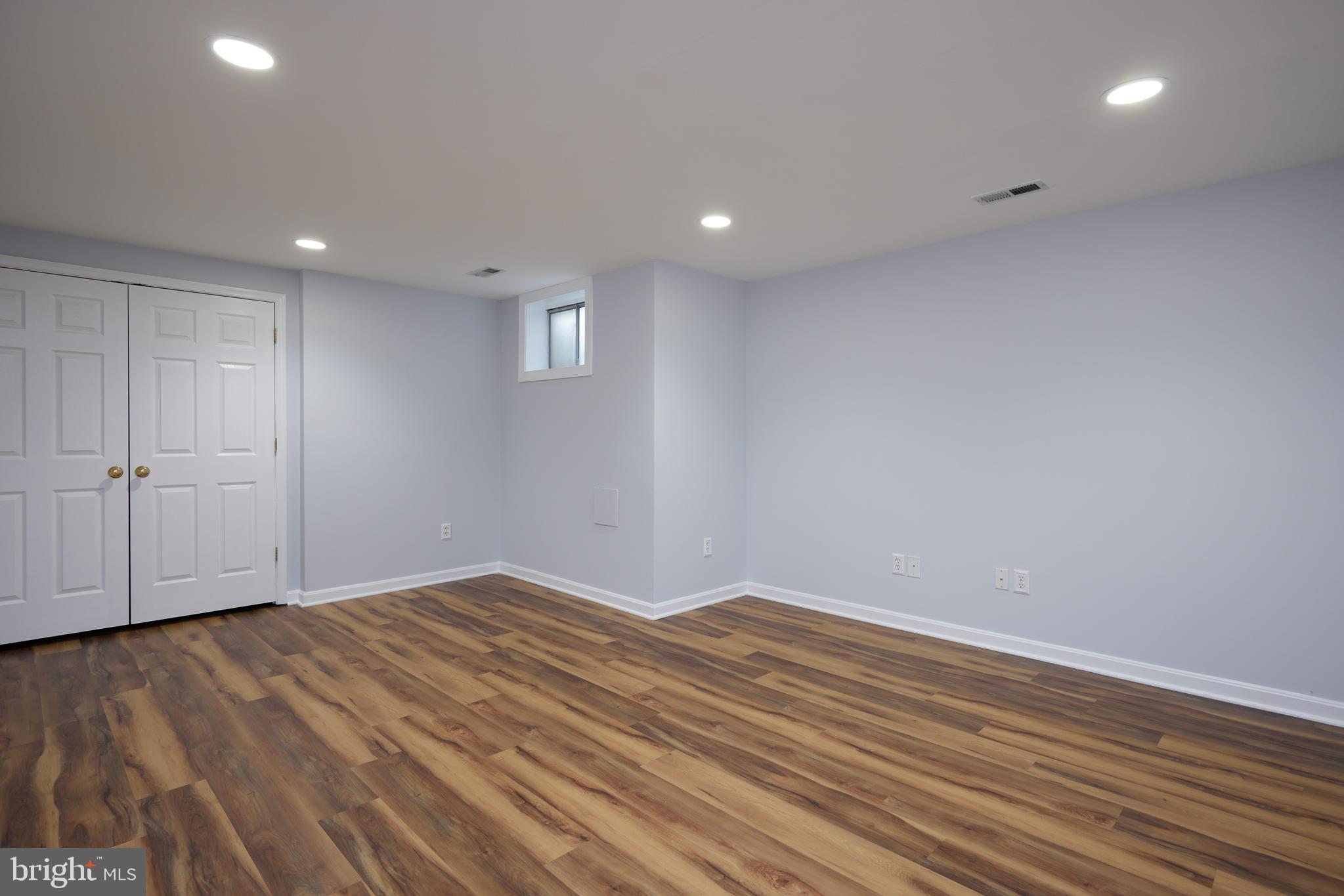 20100 Loading Rock Place Gaithersburg, MD 20886 - Photo 32 of 44 a view of empty room with wooden floor