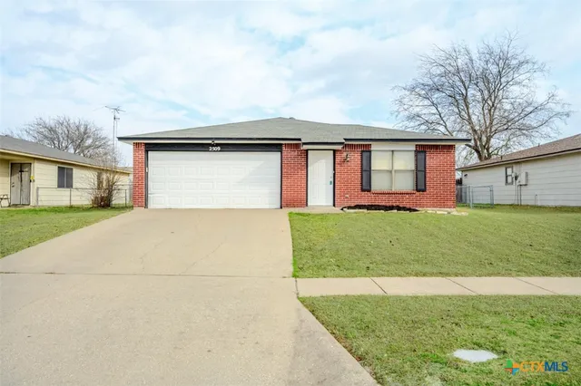 a front view of house with yard