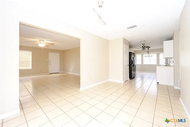 a view of livingroom with kitchen