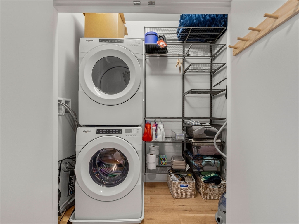 191 Washington Street, Unit 507 Boston, MA 02135 - Photo 8 of 23 a utility room with dryer and washer