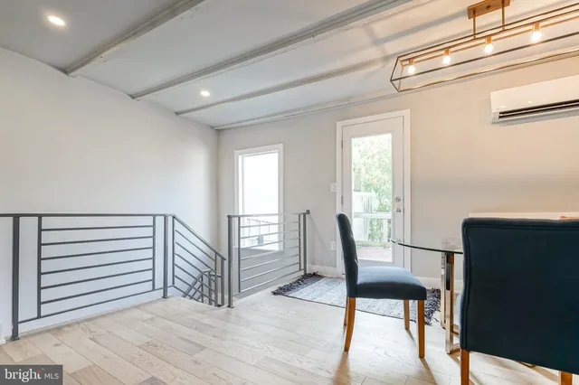 a bathroom with a double vanity sink mirror and a shower